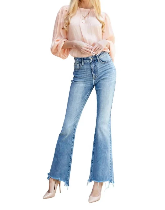 Vintage-inspired tight trousers for women with buttoned waist and retro charm -Mid Rise Boot Cut Jeans In Medium