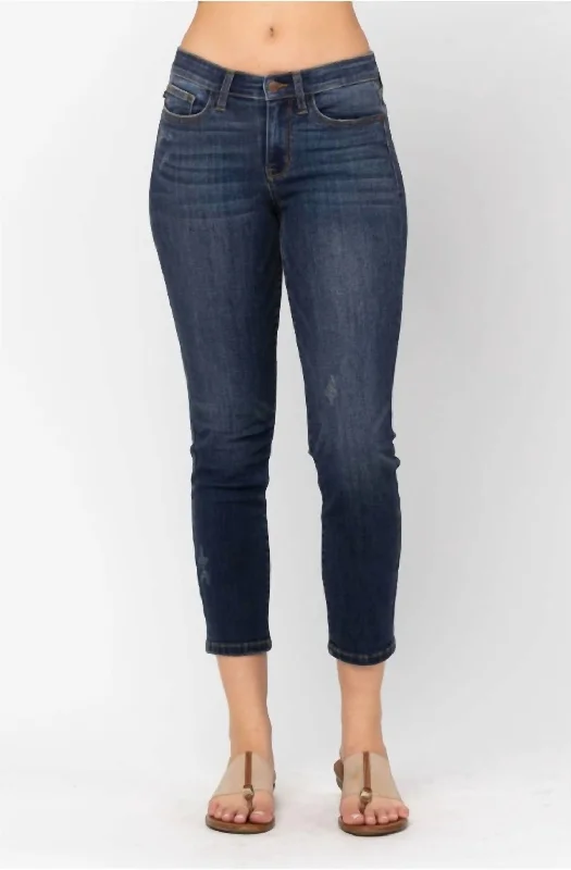 High-waisted tight trousers for women with tapered leg and vintage-inspired design -Mid Rise Cropped Relaxed Fit Denim Jean In Blue