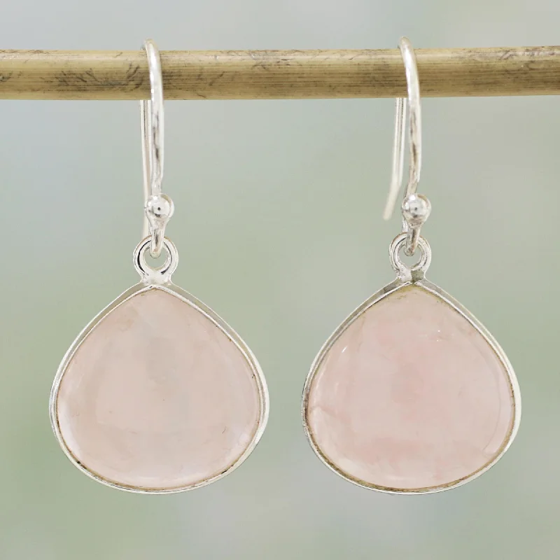 Classic hoop earrings with a thin profile for a sleek and subtle style-Dancing Soul Rose Quartz and Sterling Silver Dangle Earrings from India