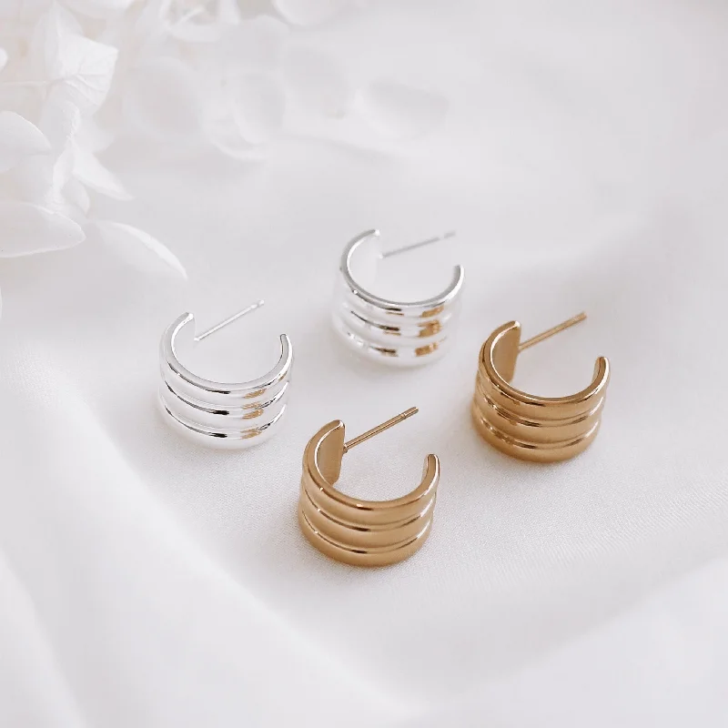 Hoop earrings with diamond-cut surfaces for added sparkle and shine-Deja - Silver Plated Stainless Steel Hoops