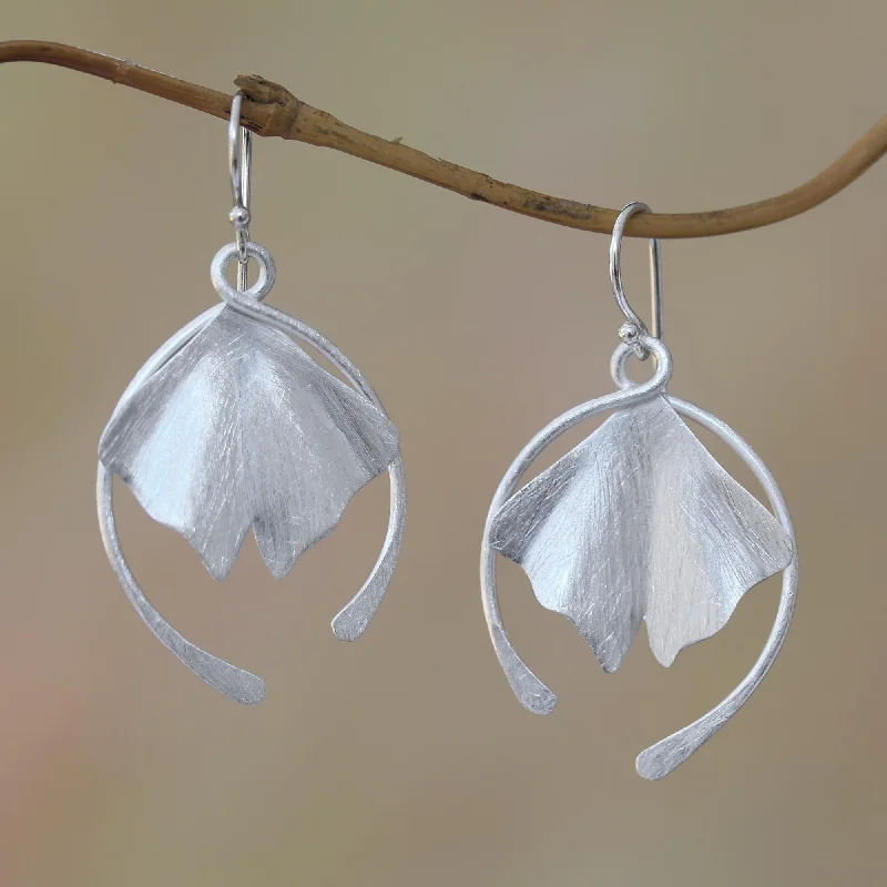 Hoop earrings with dangling charms for a playful and fun look-Flying Petals Flower Petal Sterling Silver Dangle Earrings from Bali