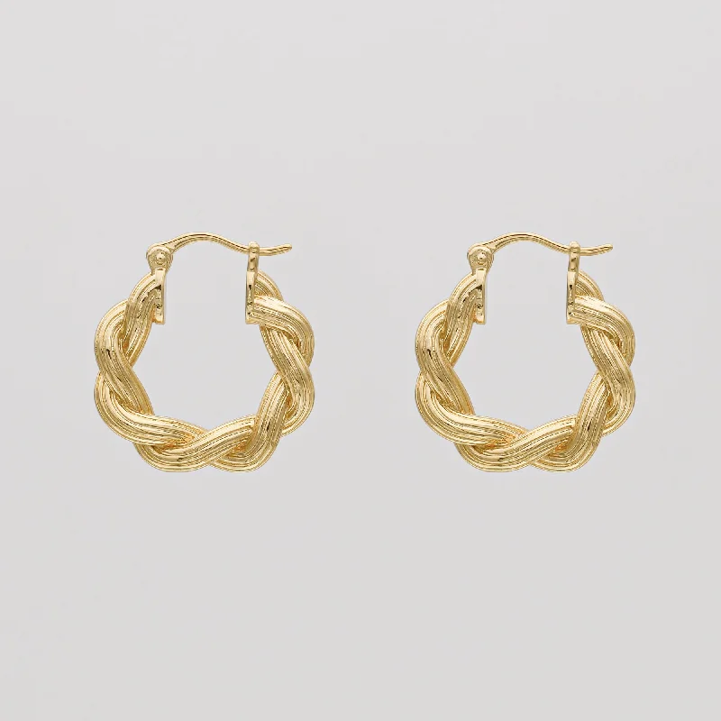 Hoop earrings with oversized designs for a bold, fashion-forward statement-Hattie Twisted Hoop Earrings