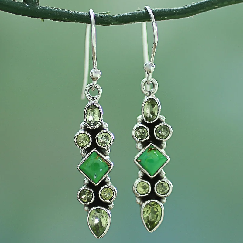 Best hoop earrings with asymmetrical designs for a fashion-forward, avant-garde look-Mesmerizing Shapes Sterling Silver Peridot Dangle Earrings from India