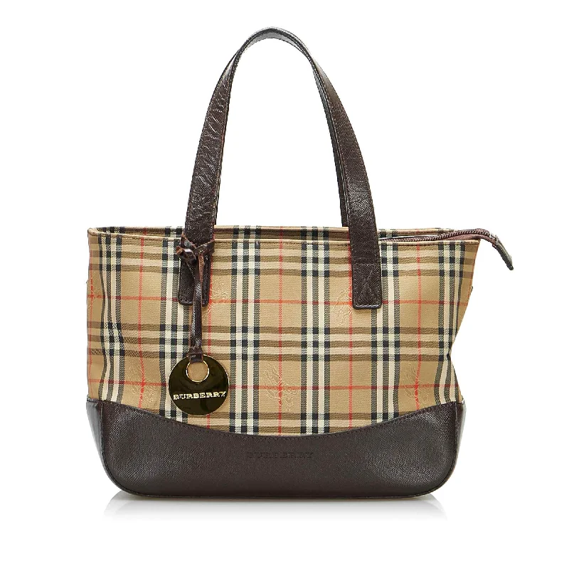 Handle bags with playful pom-poms for charm -Burberry Haymarket Check multi Canvas Handbag