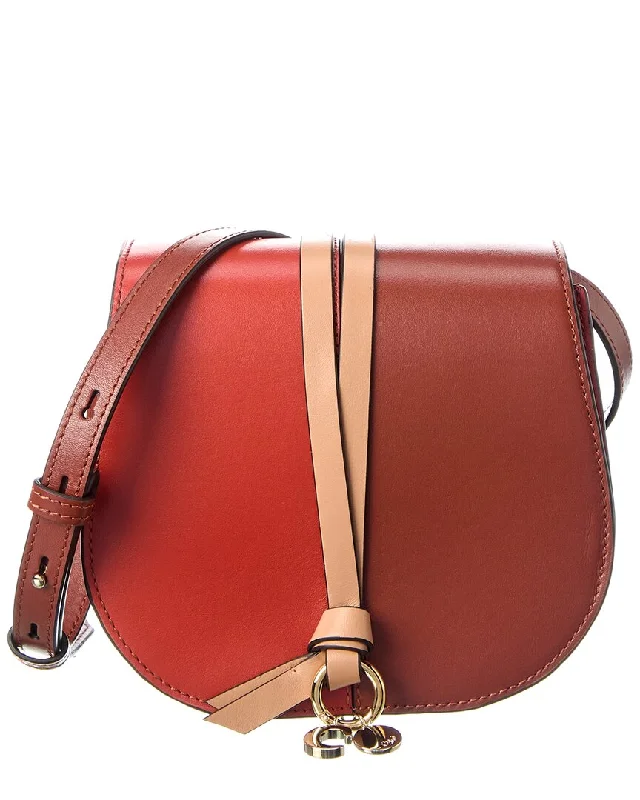 Reversible handle bags offering dual design styles -Chloé Alphabet Mini Leather Saddle Bag