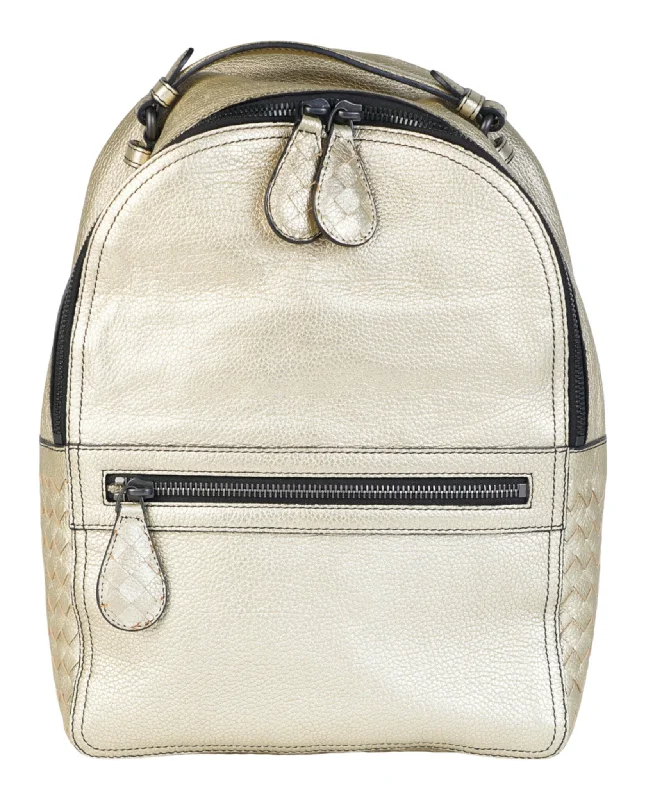 Handle bags with vintage vibes for nostalgia -Metallic Leather Backpack